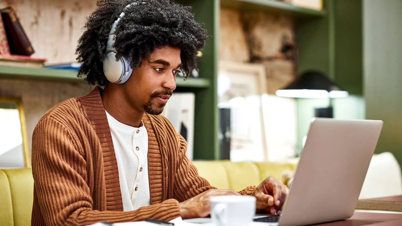 man working on his computer