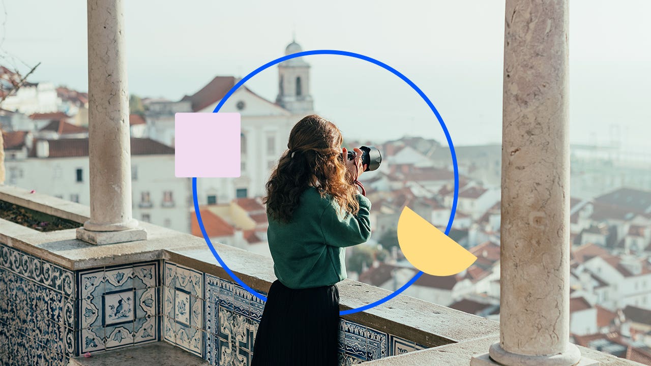 design element including a women taking a photo from a balcony