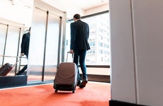 businessman leaving a hotel