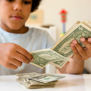 child counting cash