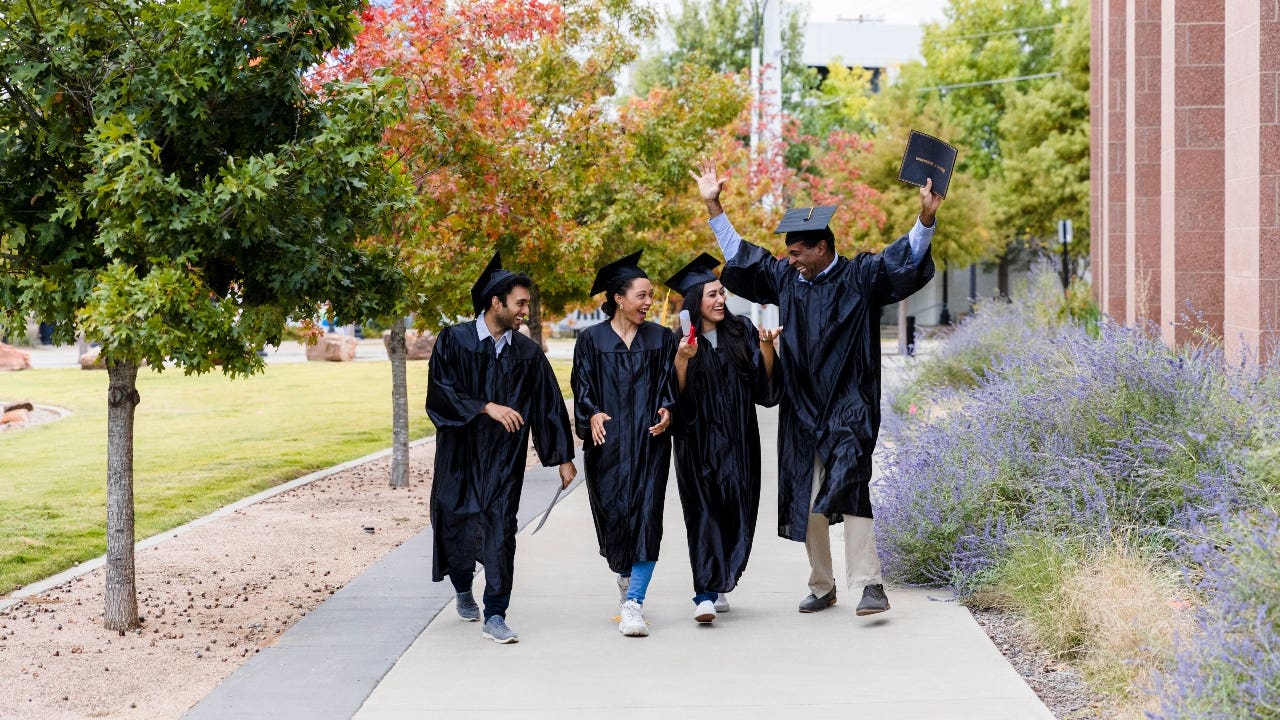 College graduates talk after graduation