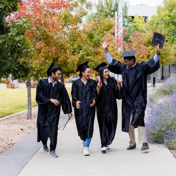College graduates talk after graduation