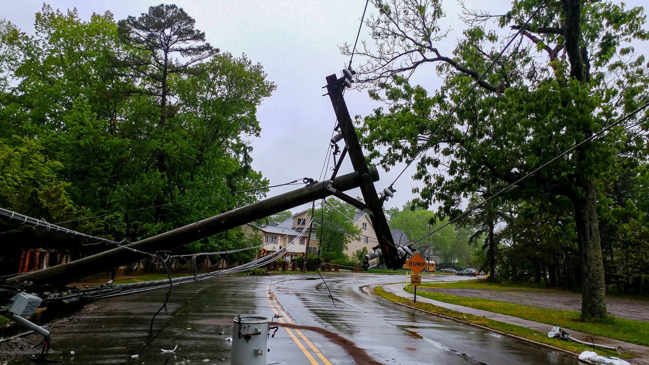 power lines knocked down and damaged after a storm