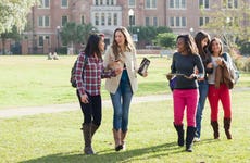 Group of college students walks on campus