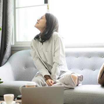 A woman enjoying the air quality in her home