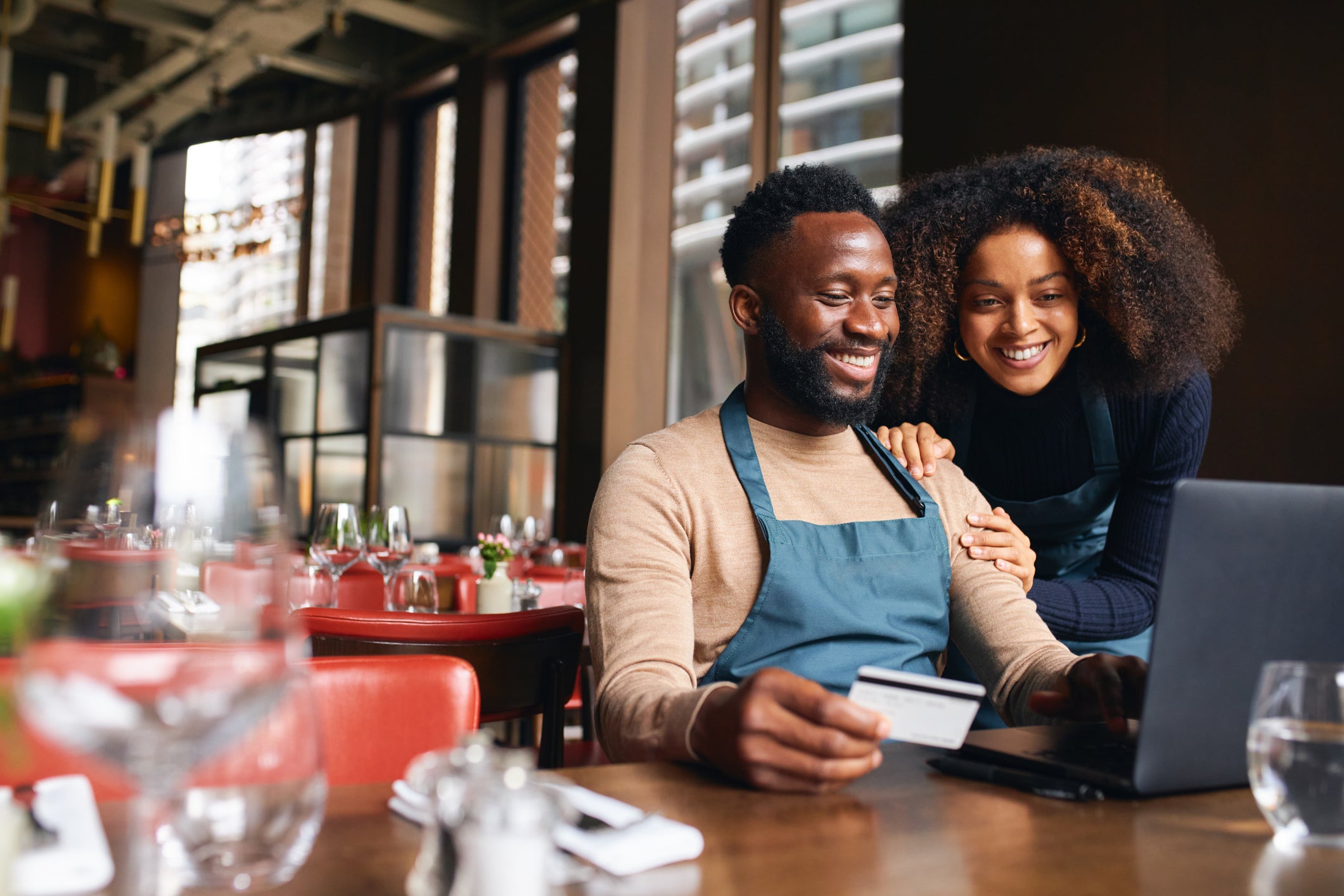 Restaurant owners using a credit card online