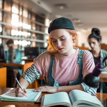 college student working in the library