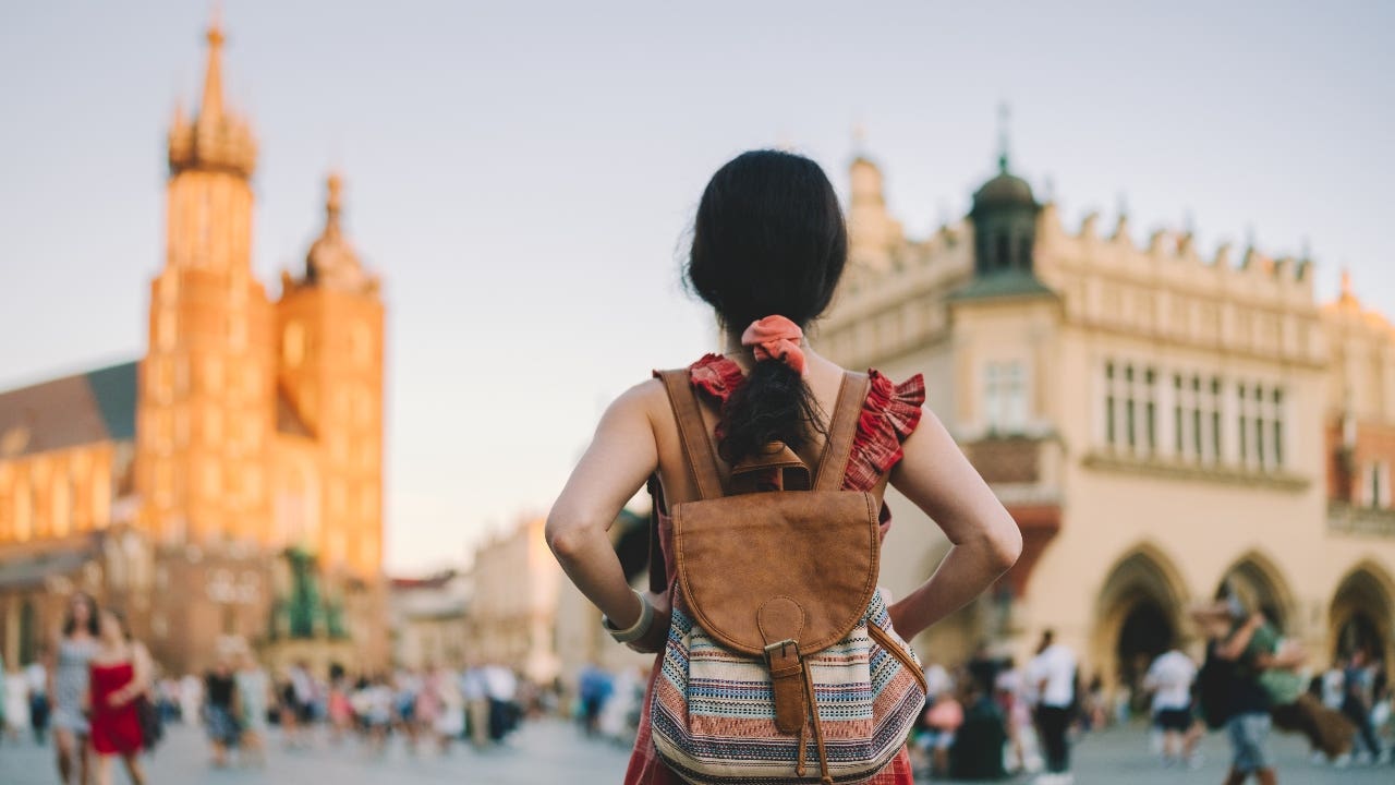 Young woman sightsees in Europe