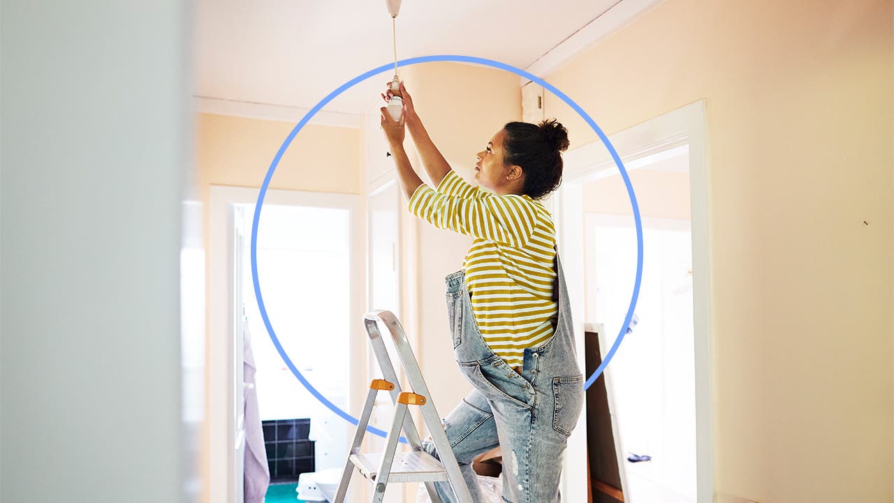 Illustrated graphic featuring a woman on a ladder adding a light fixture