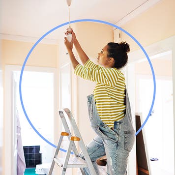 Illustrated graphic featuring a woman on a ladder adding a light fixture