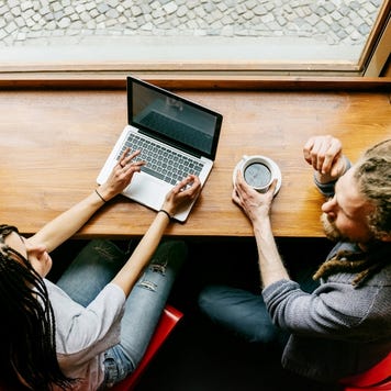Two people in a cafe