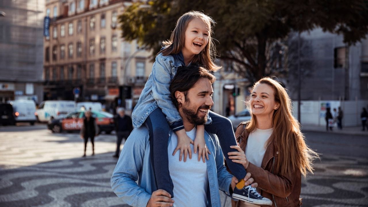 Family walking together on a street