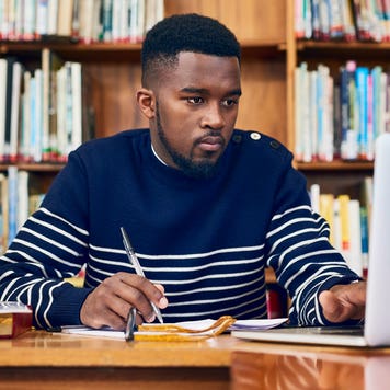 college student working in the library