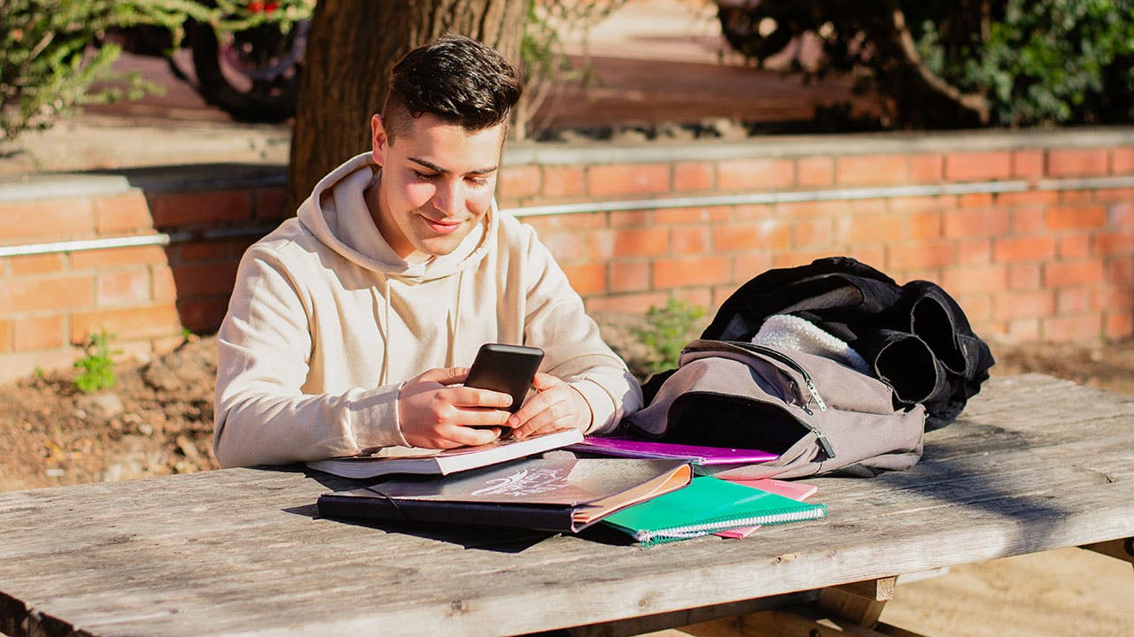 student using credit card