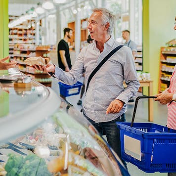 Couple Shopping At Supermarket