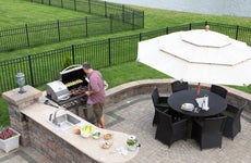 Outdoor kitchen area with grill