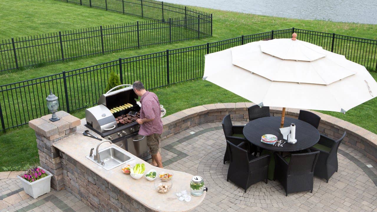 Outdoor kitchen area with grill