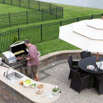 Outdoor kitchen area with grill