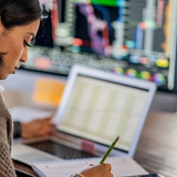 woman researches investments