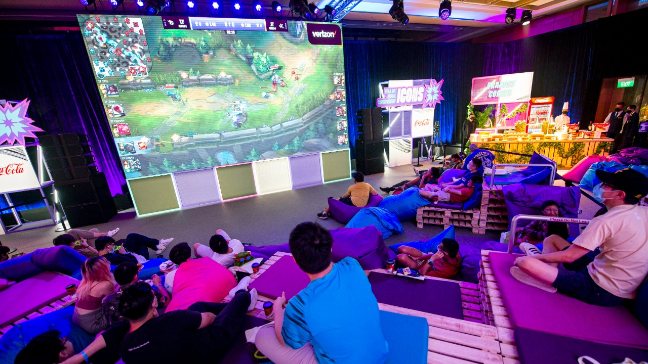 People watch gamers compete in esports