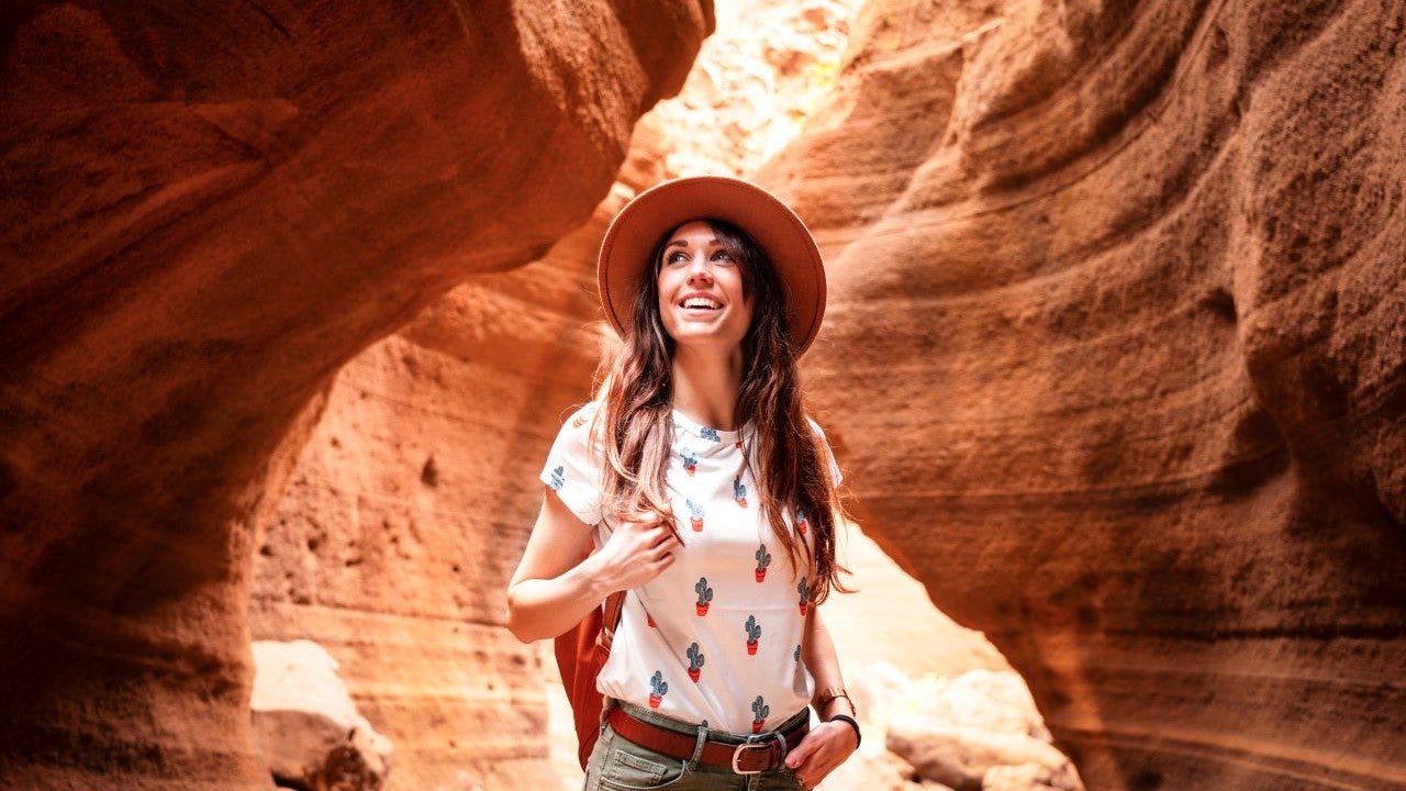 woman exploring a canyon