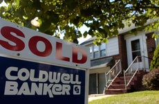 Coldwell Banker "Sold" sign outside of a home