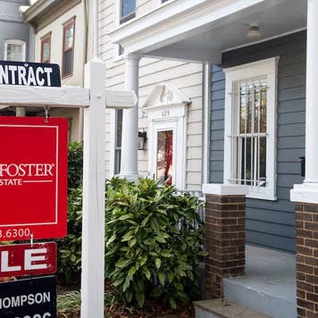 Under contract sign in front of a home