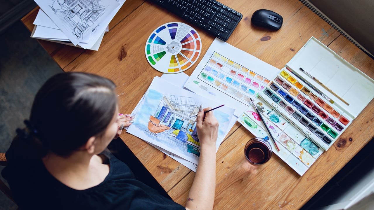 Woman painting watercolor