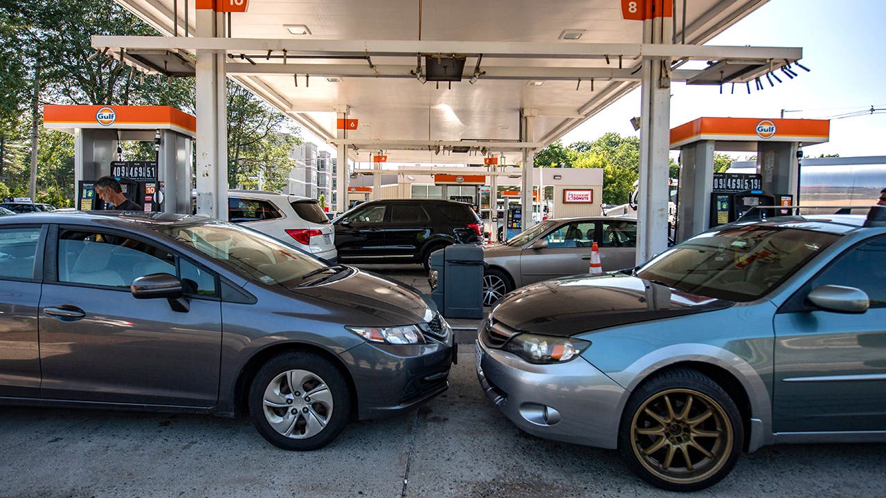 Cars sit at gas pumps at a Gulf gas station, which is selling regular gas at $4.09 a gallon, in Lynnfield, Massachusetts, on July 19, 2022