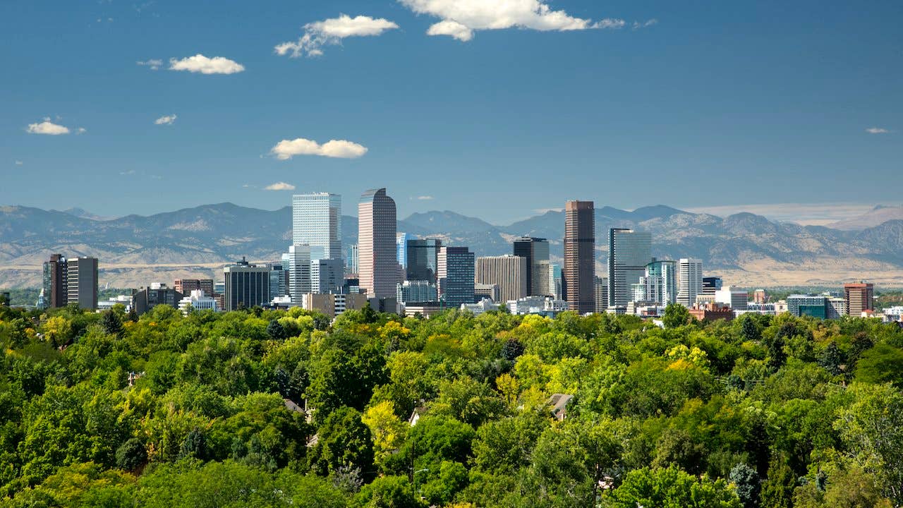 View of the Denver skyline with the Rocky Mountains in the background