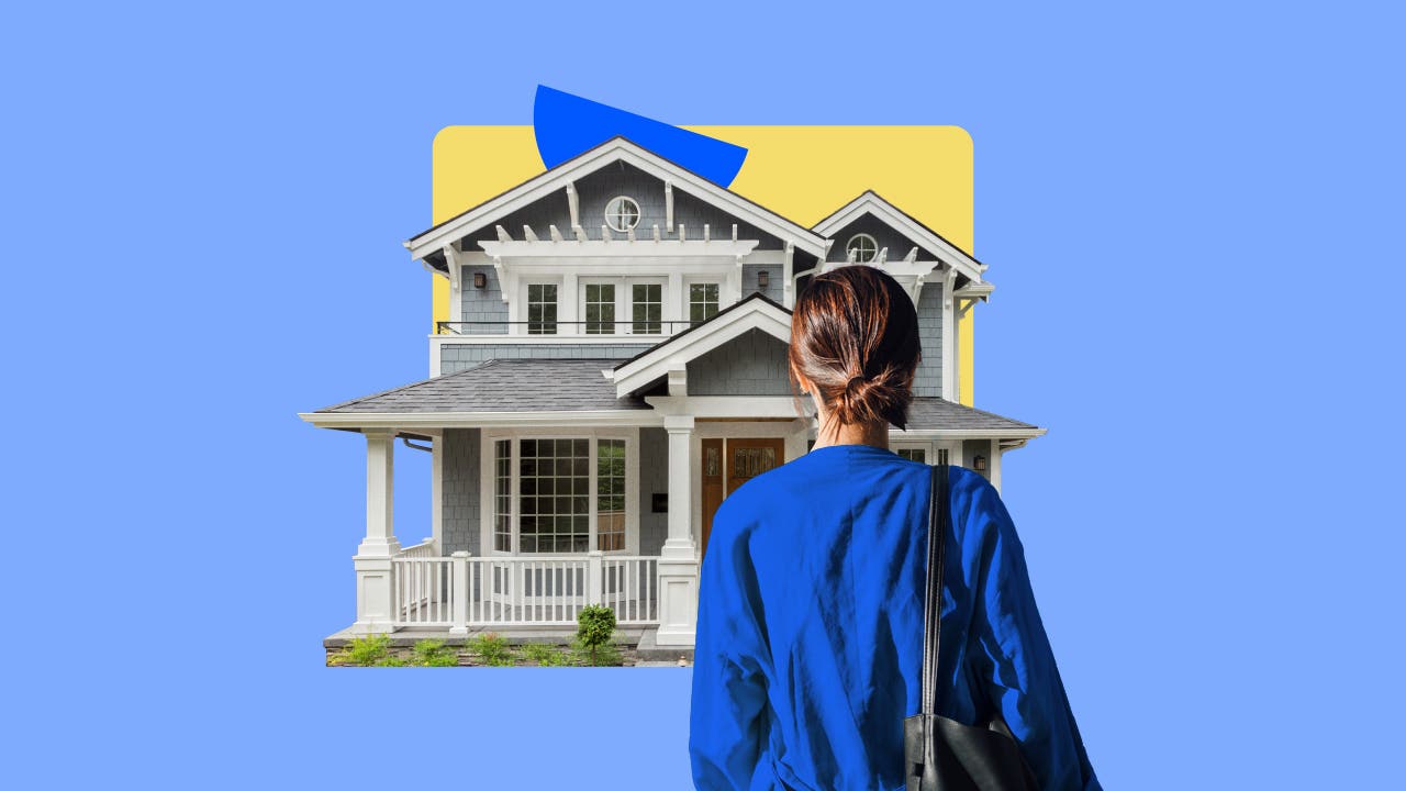common home styles - woman looking at victorian house