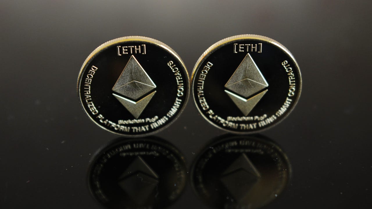 Two physical representations of Ethereum coins