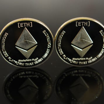 Two physical representations of Ethereum coins