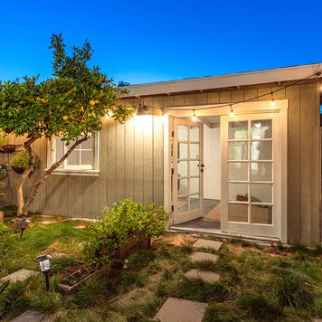 Modern Tiny Home Guest House at twilight.