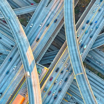 Aerial view of highway interchange in cityscape