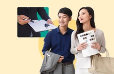 An illustration with an Asian couple considering a lease agreement.