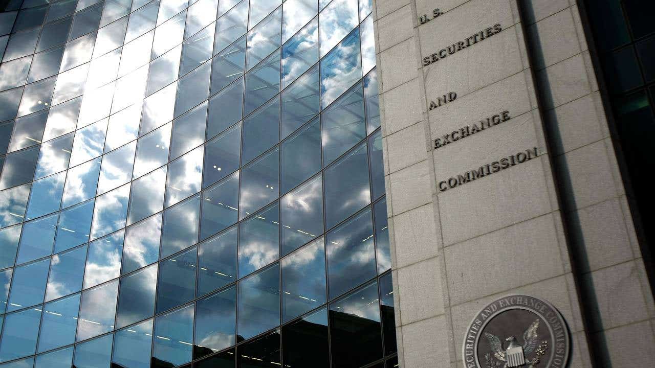 clouds reflecting in the windows of the SEC building
