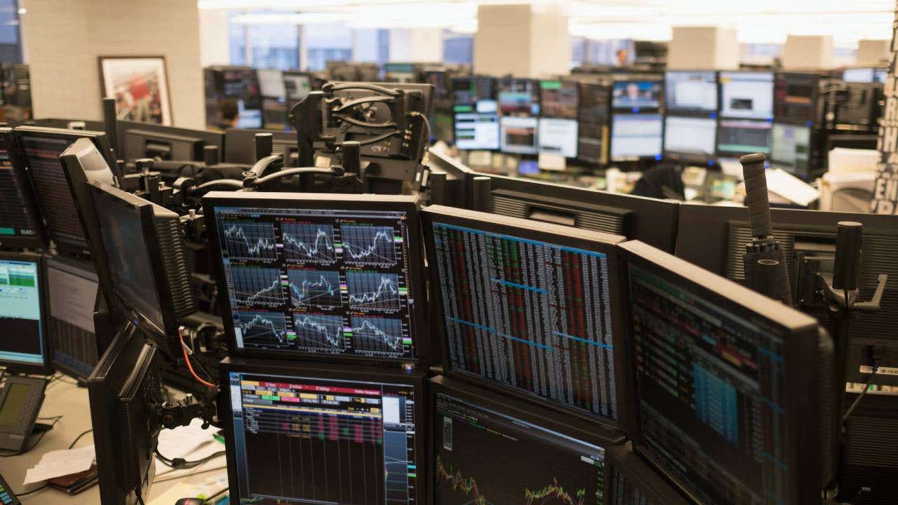 Trading floor with working computers