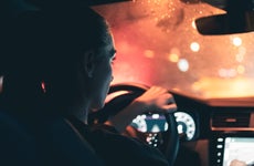 woman driving at night