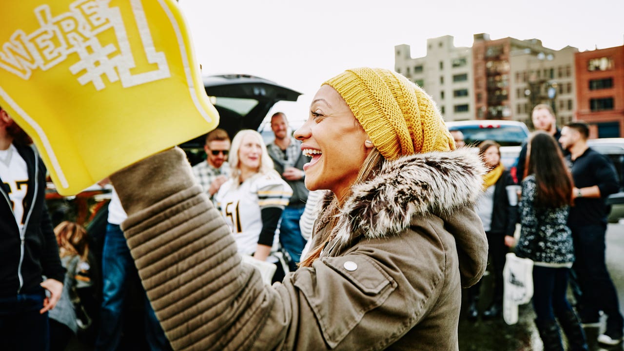 a fan with a foam finger