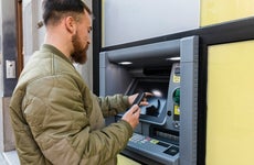 man using an atm