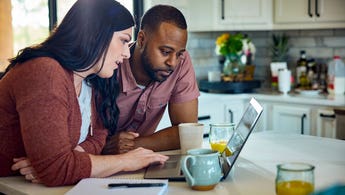 couple looking at laptop together