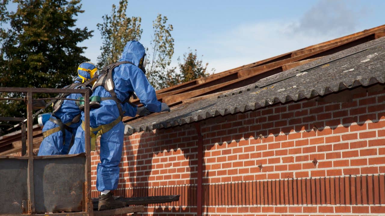 Checking for asbestos in protective workwear.