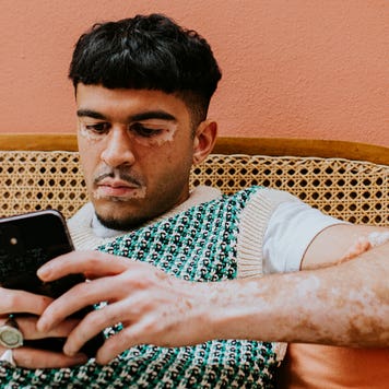 man using his cell phone