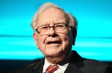 Warren Buffet speaking on stage