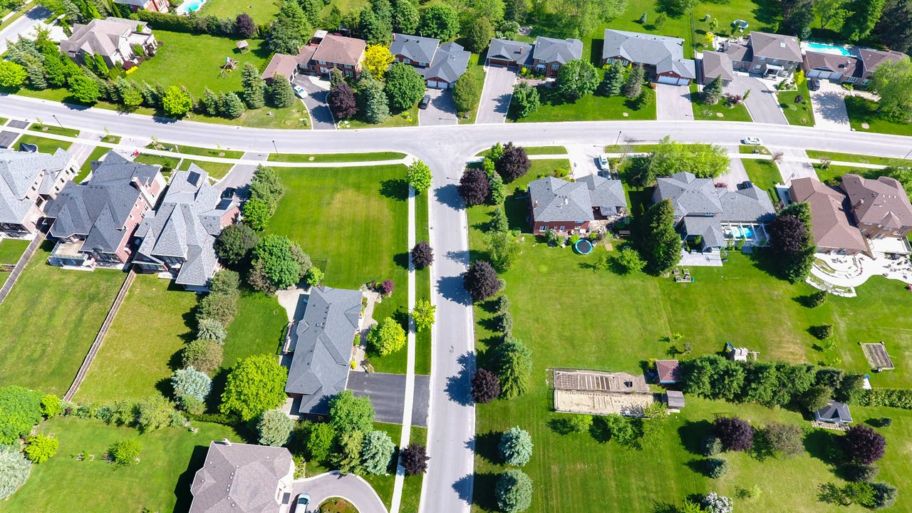 aerial view of houses along a suburban street