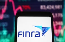 The FINRA logo on a mobile phone