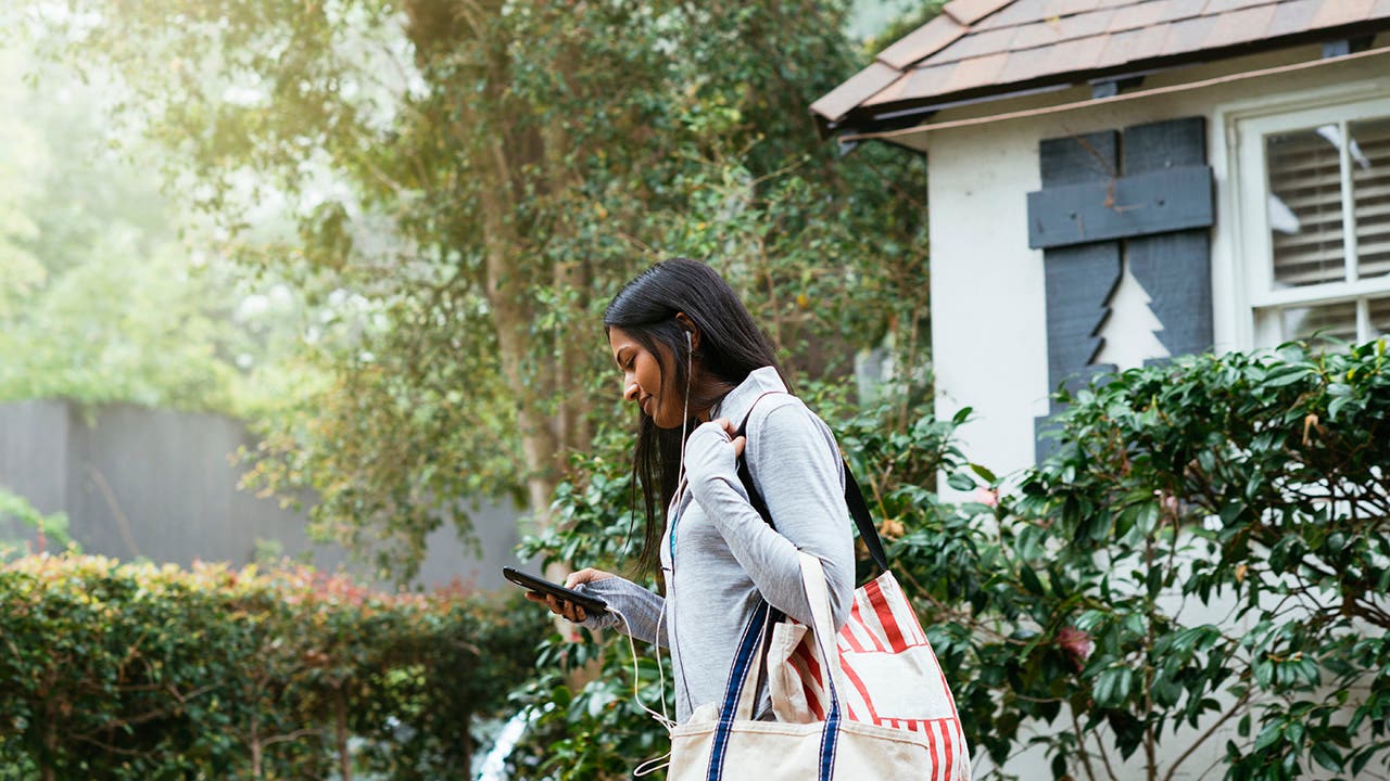 woman looking at her phone