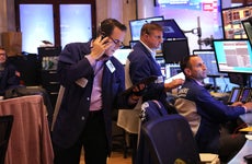 Stock traders looking focus and busy on the trading floor