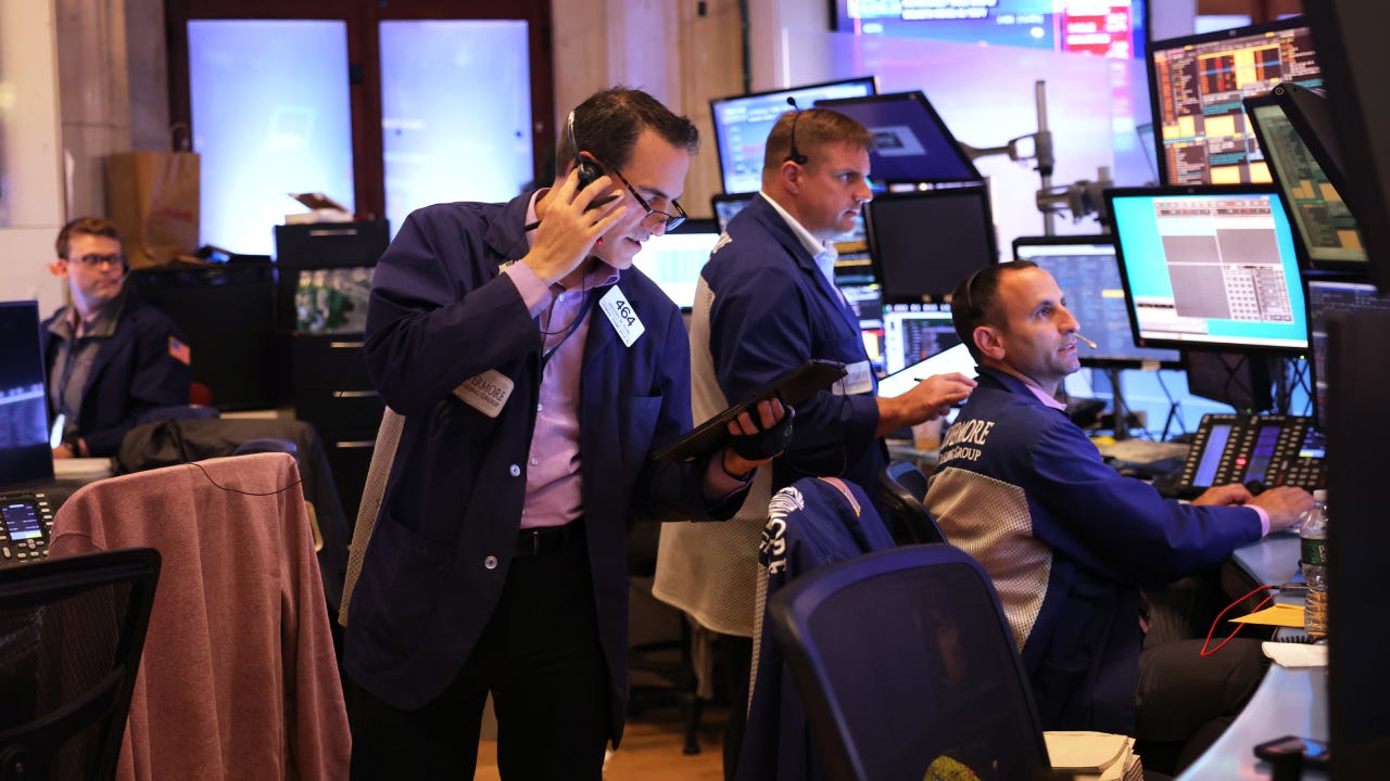 Stock traders looking focus and busy on the trading floor